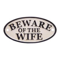 A CAST IRON "BEWARE OF THE WIFE" PLAQUE
